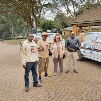 Foundation members and supporters gathered beside a Walk for Elephants vehicle